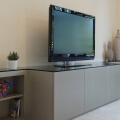 TV and media unit in spraylacquered oak and glass top - part view