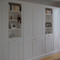 Wall-to-wall fitted wardrobe with open shelves