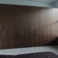 Fitted large wardrobe in walnut