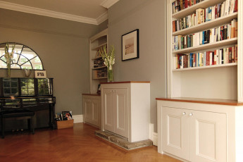 Row of four fitted units with oak tops - part view 2