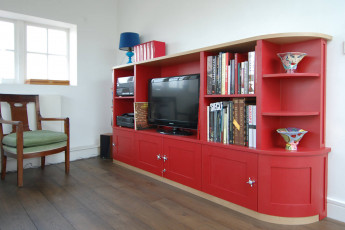 Bespoke media unit with curved corners and oak top