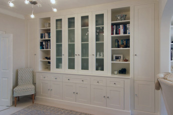 Large fitted display unit with drawers, cupboards and shelves
