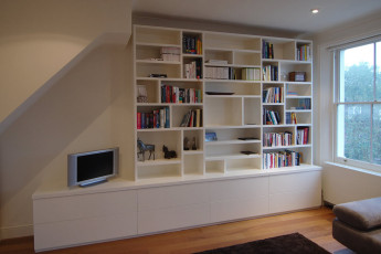 Large display unit with push-to-open drawers