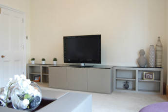 TV and media unit in spraylacquered oak and glass top
