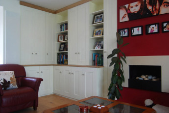 Display shelves with cupboards housing home office