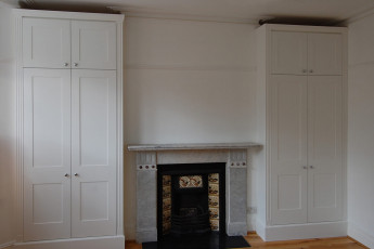 Pair of fitted bespoke alcove wardrobes