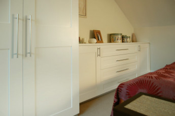 Attic wardrobe with chest of drawers - part view