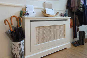 Radiator cover with natural cane mesh